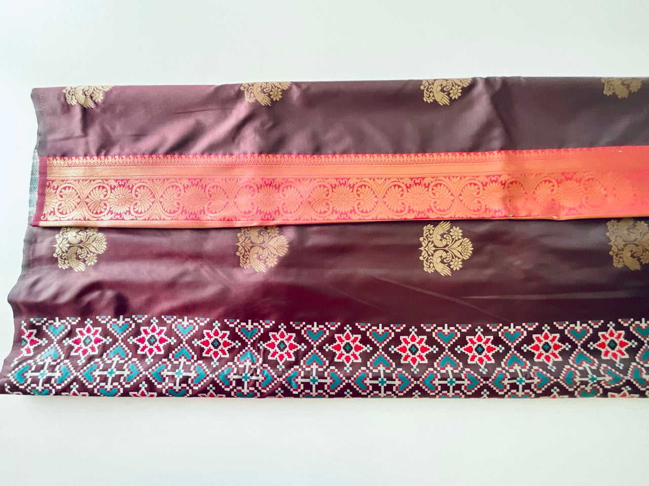 Dark Brown & Pink Saree with Gold Peacock Motifs