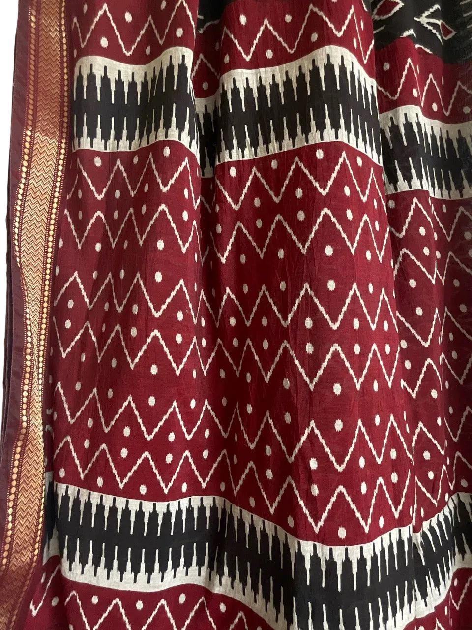Aariyaa Black & Maroon Ikat Saree with Gold Border