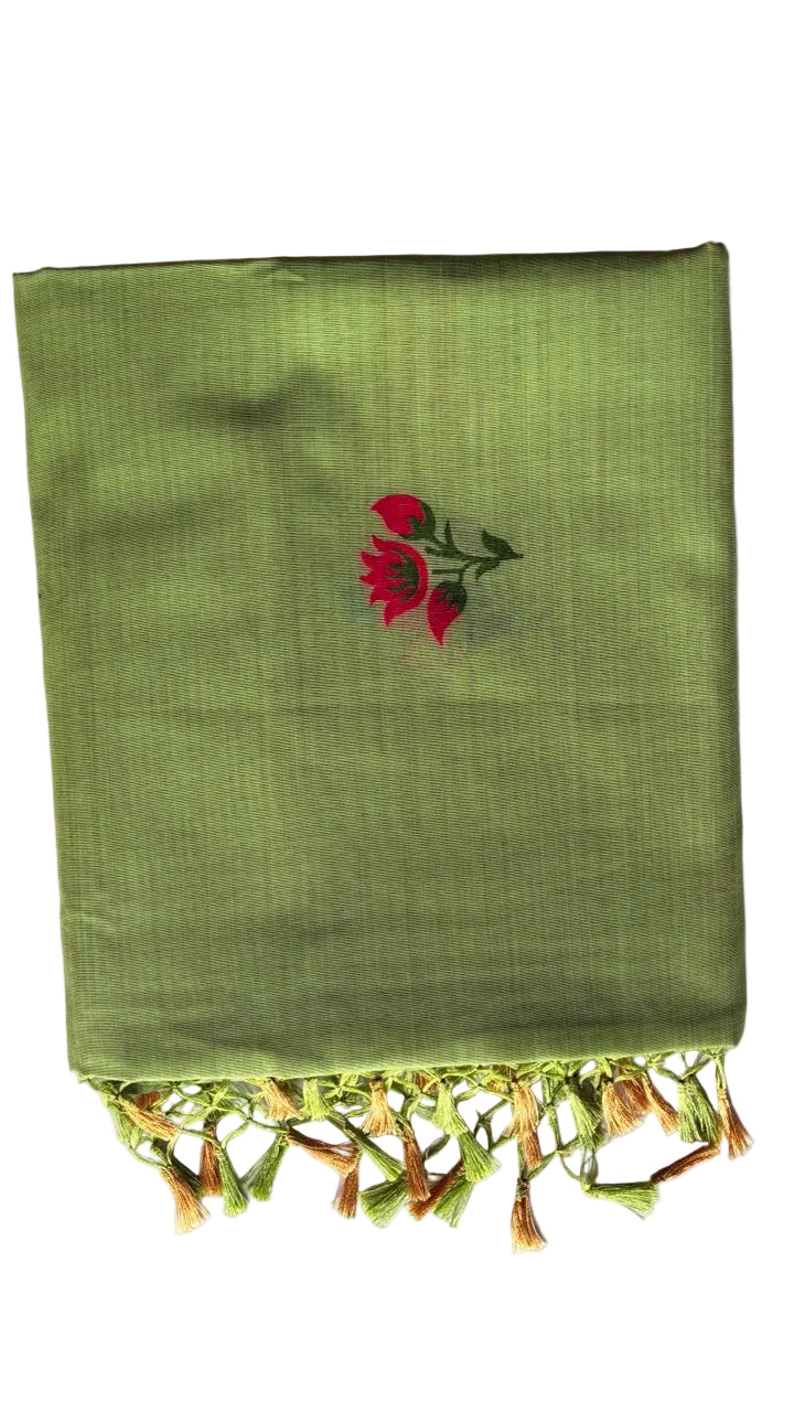 parrot  green with bright floral woven pallu aariyaa saree