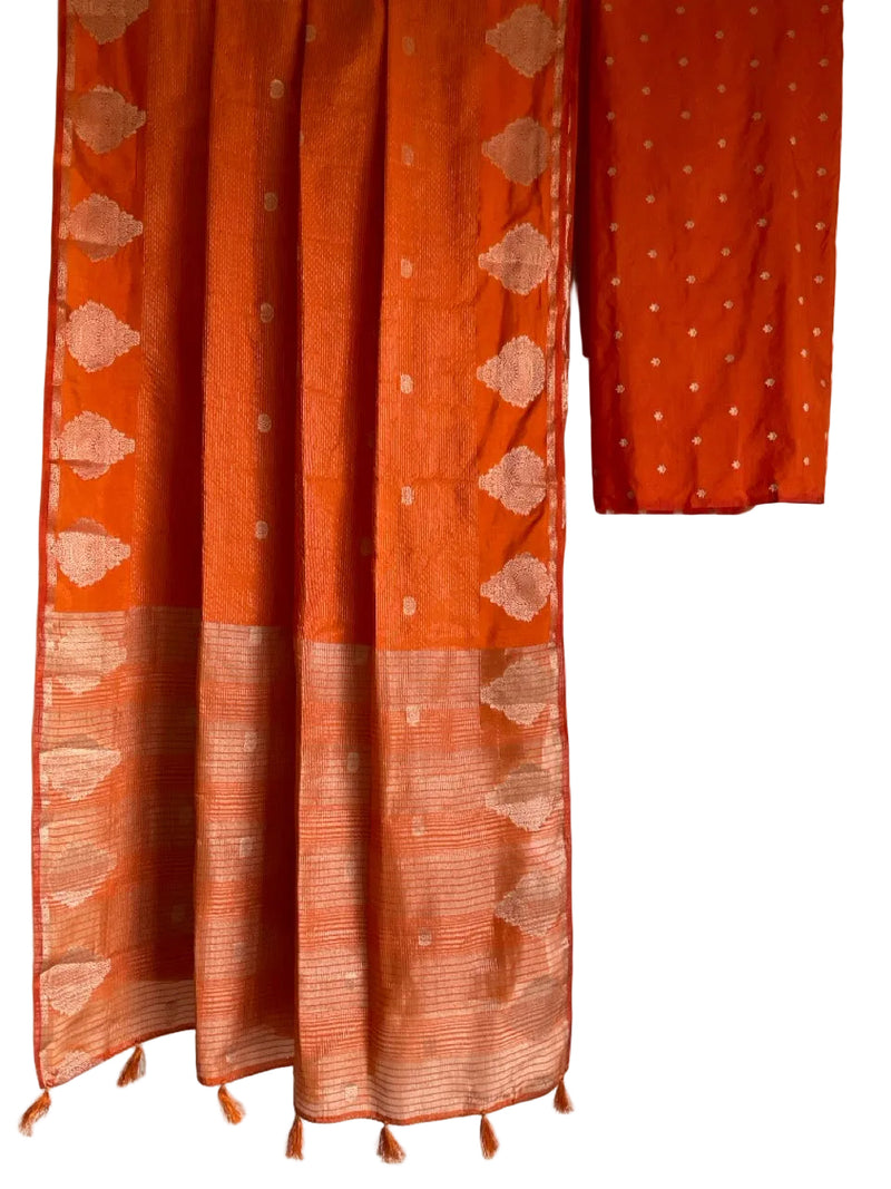 Orange saree with geometric patterns on a white background
