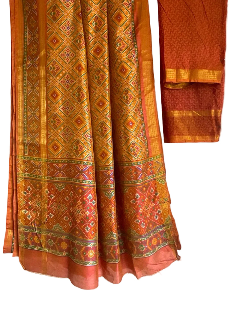 Traditional orange and brown patterned  Patola saree with blouse