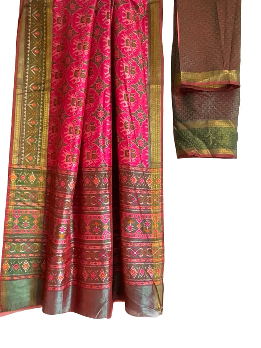 Traditional pink saree with intricate patterns on a white background