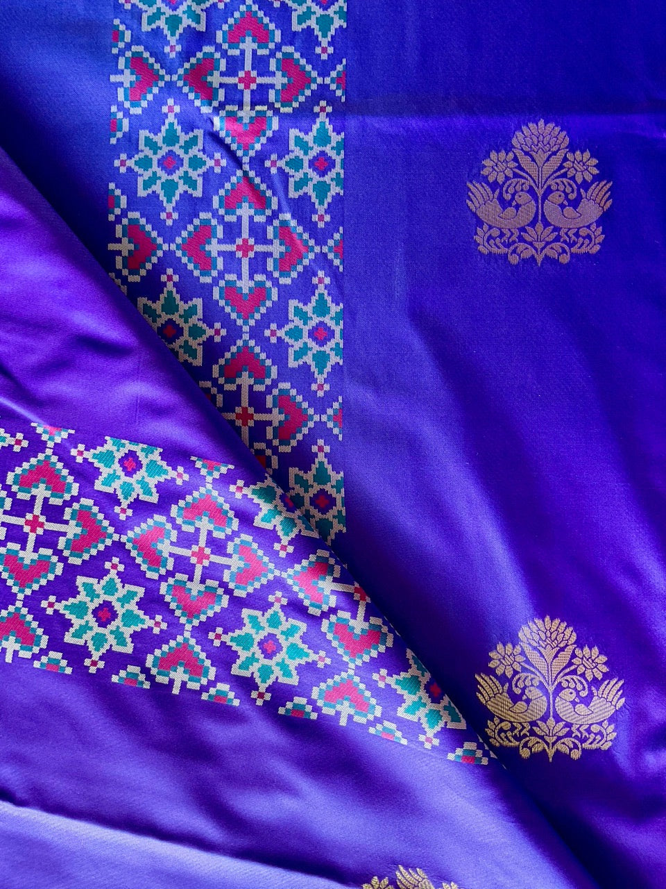 Royal Purple & Teal Silk Saree with Silver Peacock Buttas & patola Border