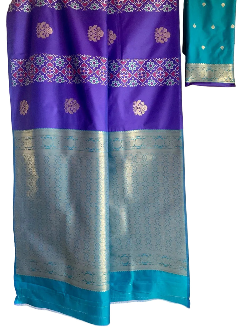Royal Purple & Teal Silk Saree with Silver Peacock Buttas & Ikat Border