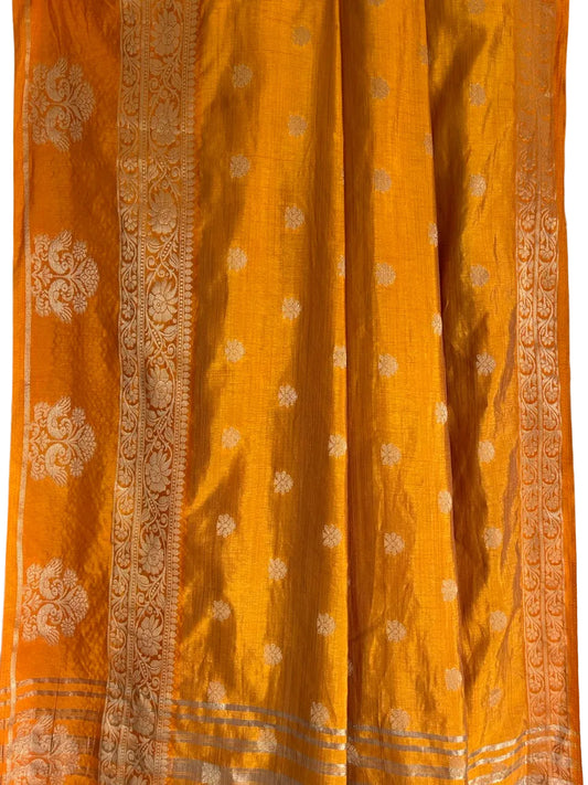 golden yellow aariyaa saree with buttas