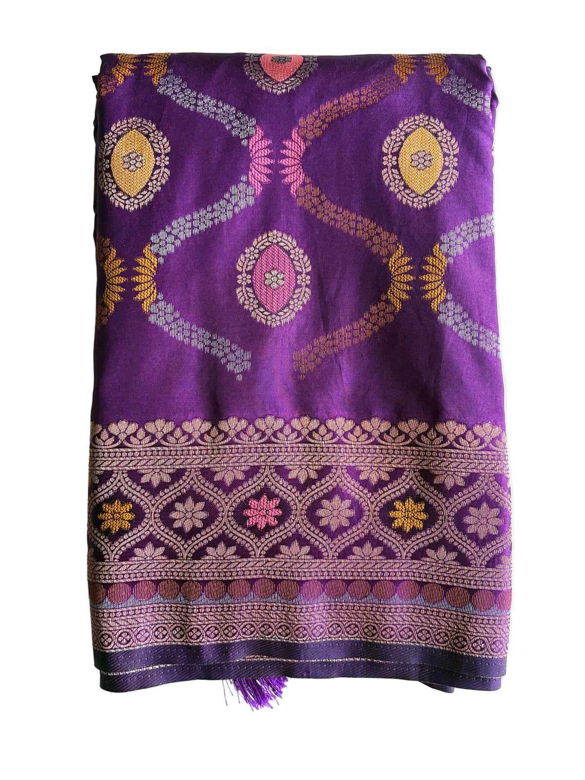 Neatly folded light comfortable purple soft silk saree showing metallic border and floral motifs