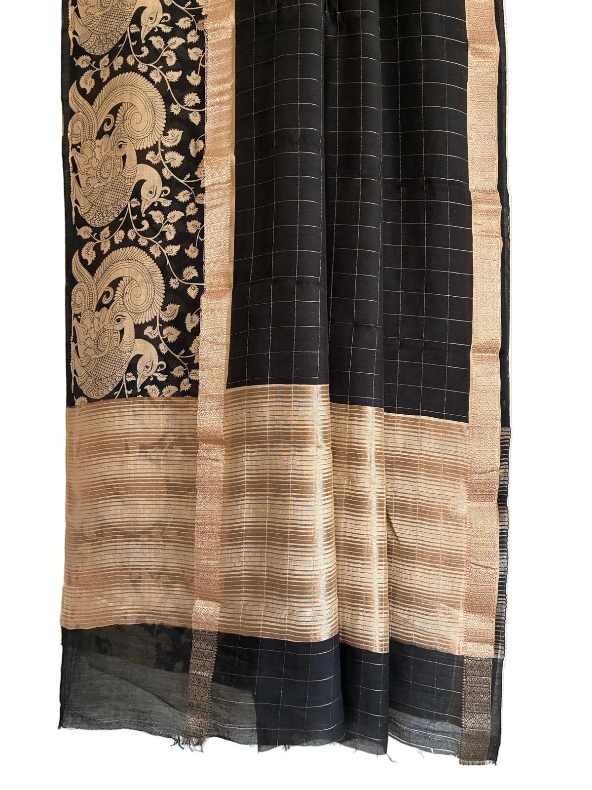 Detailed view of pallu of ivory Kalamkari peacock pallu on black checked Assam silk saree Aariyaa studio 