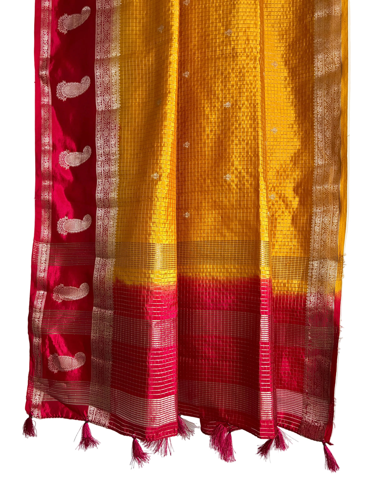 Detailed view of yellow checked saree pallu framed by red border with gold mango design