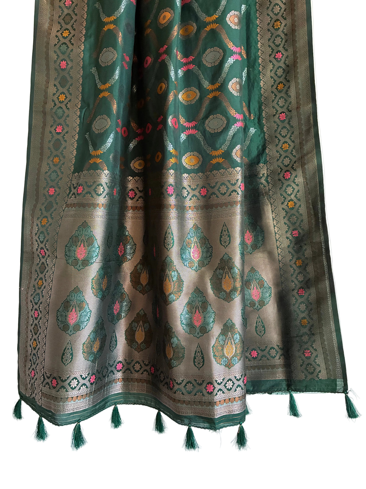 Detailed view of rich emerald green saree pallu with ornate Banarasi detailing and matching tassels