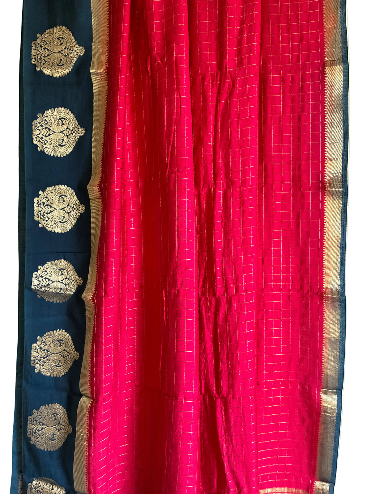 Close up of soft breathable pink saree weave showing fine gold grid checks and zari motifs