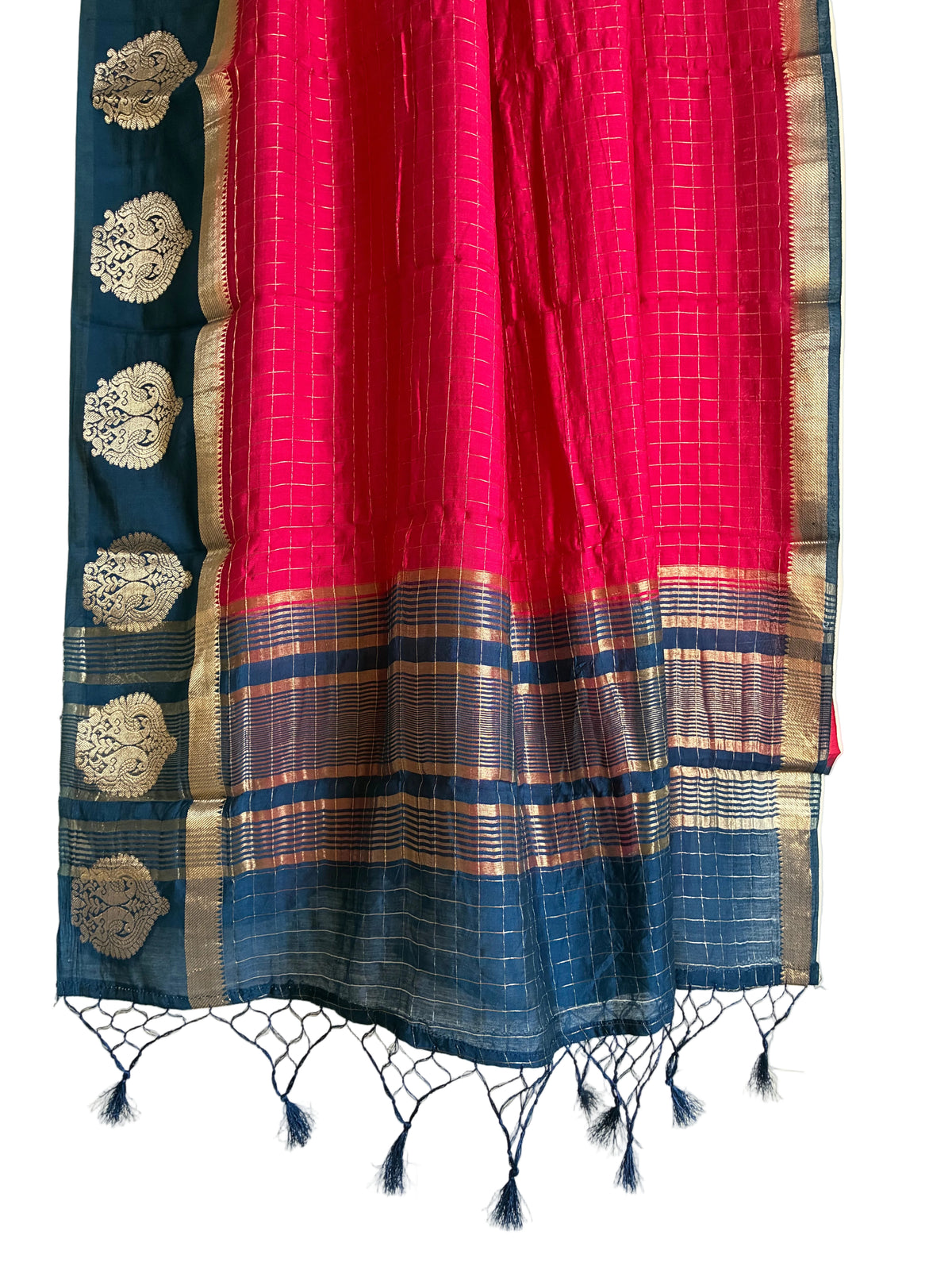 Detailed view of magenta pink saree pallu with navy blue gold zari stripes and navy tassels