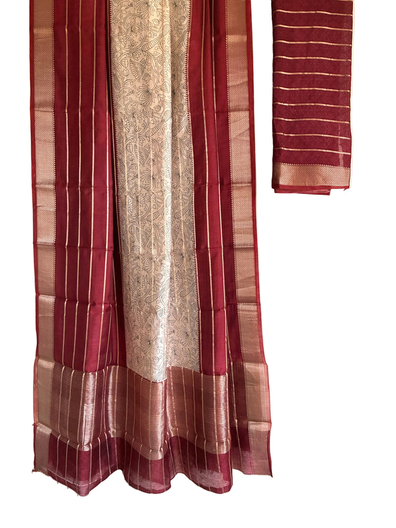 Deep red Kalamkari motif saree with white floral patterns fine gold stripes full drape view Aariyaa sarees Bangalore