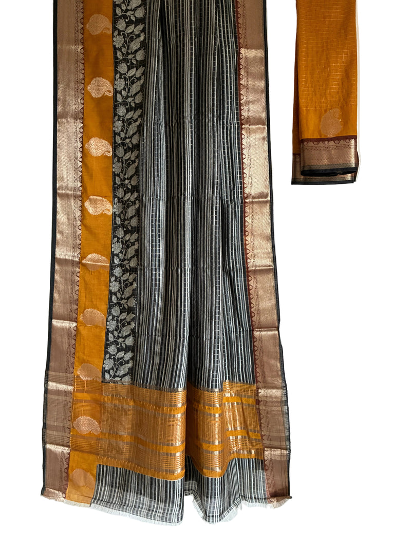 Black and mustard Assam silk saree with Kalamkari floral border full drape view Aariyaa sarees Bengaluru