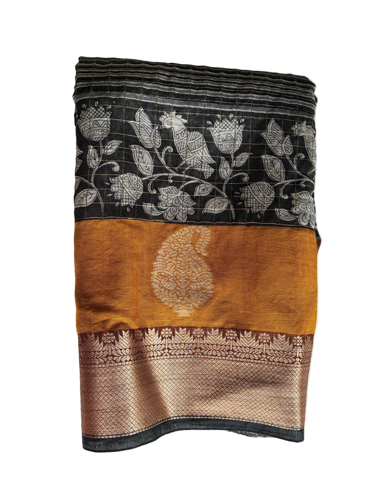 Neatly folded light comfortable black and mustard Kalamkari Assam silk saree showing gold border