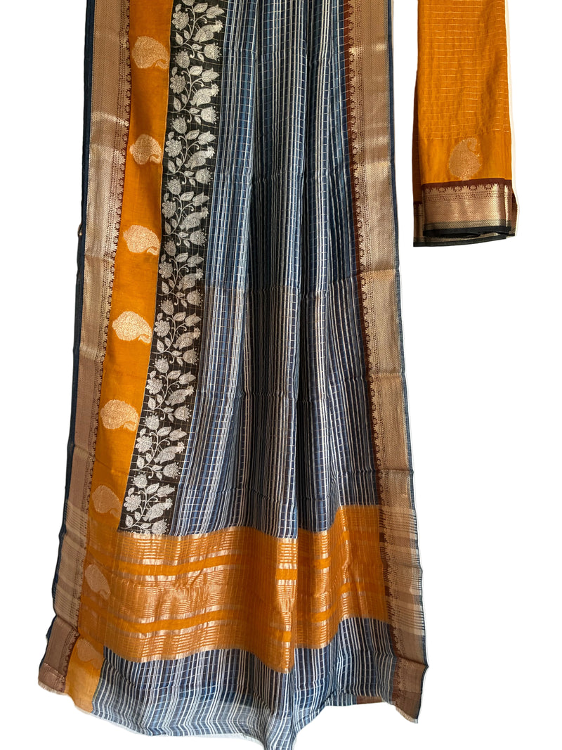 Blue and mustard Assam silk saree with black Kalamkari floral border full drape view Aariyaa studio Bangalore