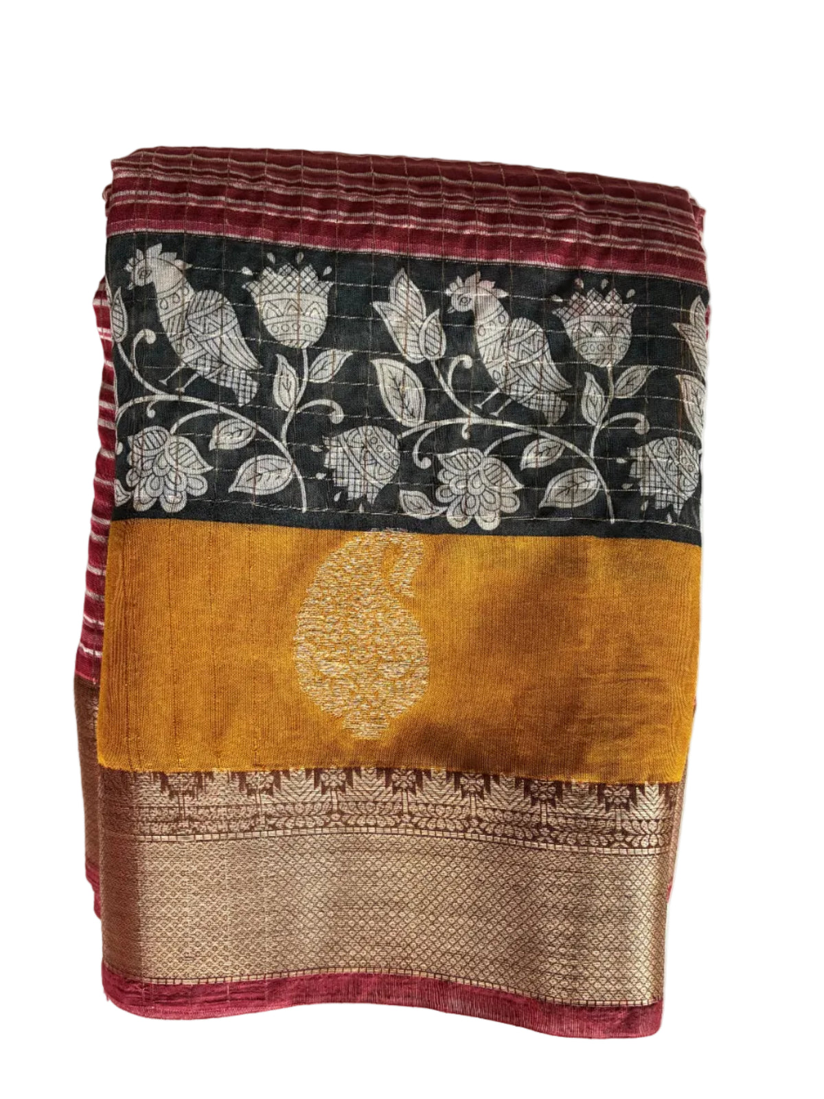 Neatly folded light comfortable red and mustard Kalamkari silk saree displaying lustrous border