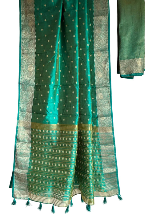 Teal blue saree dotted with gold butti motifs and intricate floral border full drape view Aariyaa sarees Bengaluru