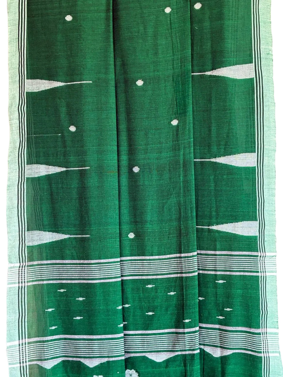 Green traditional garment with white patterns on a white background