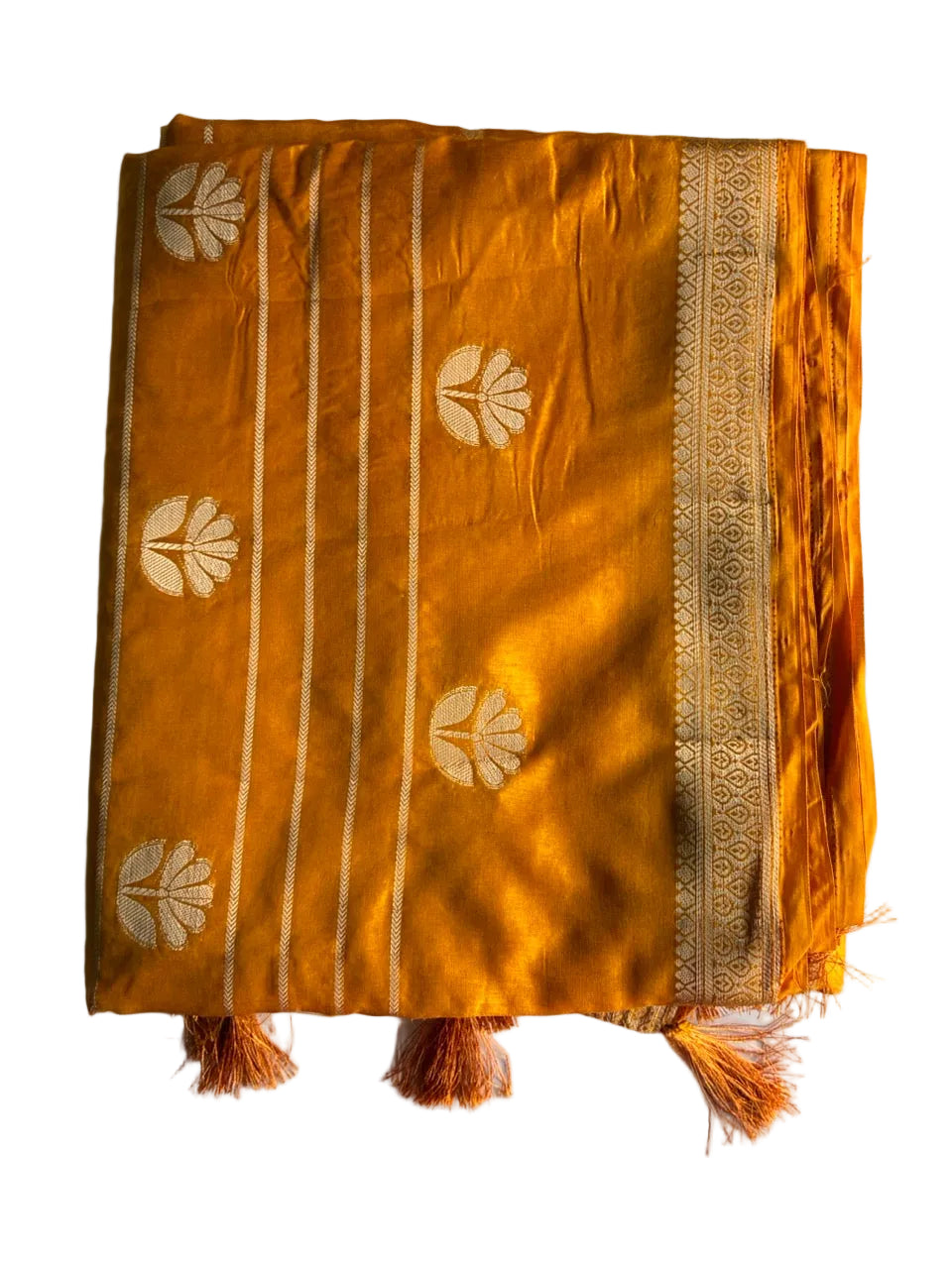Neatly folded light comfortable meenakari yellow saree displaying gold border and floral motifs