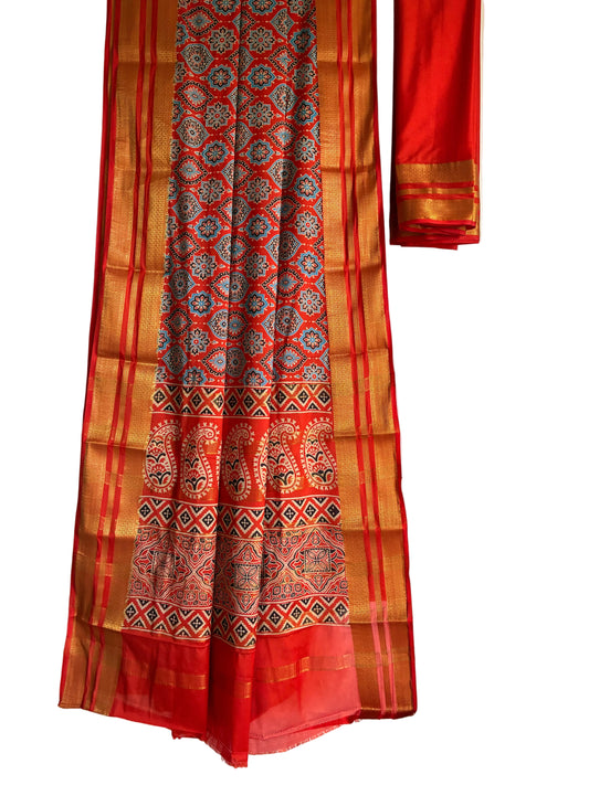 Traditional orange saree with Gandhabherunda double headed bird motifs full drape view Aariyaa sarees Bengaluru