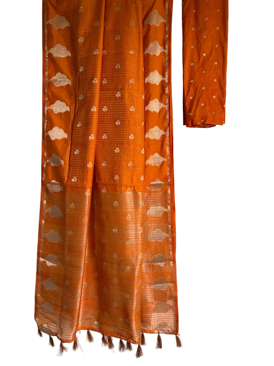 Vibrant orange saree with gold tone butis and leaf motif border full drape view Aariyaa studio Bangalore