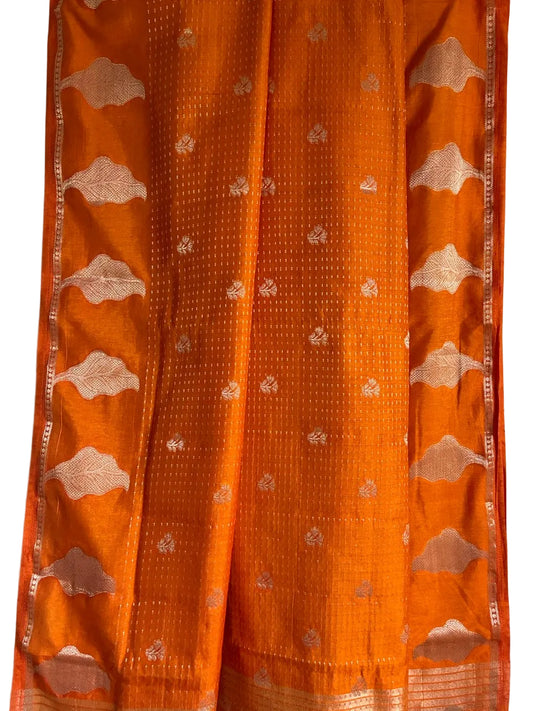 Vibrant orange saree with gold tone butis and leaf motif border full drape view Aariyaa studio Bangalore