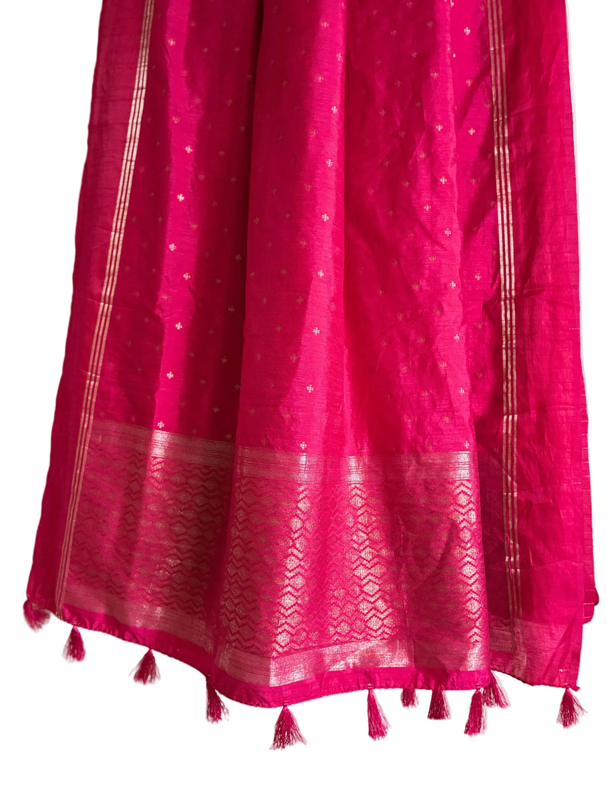 Detailed view of elegant bright pink jute silk saree pallu styled for festive occasions