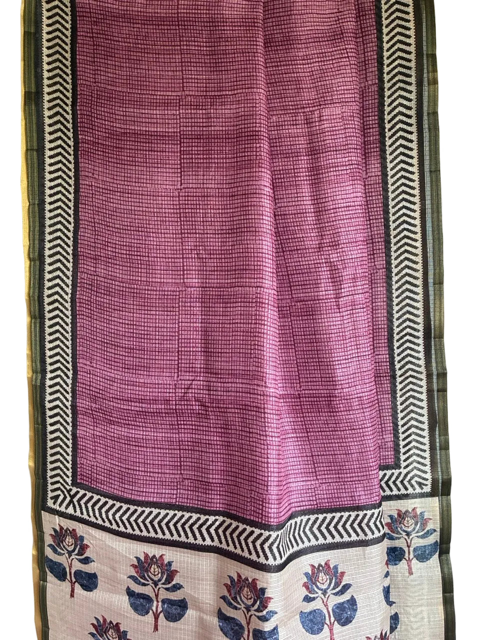 Close up of airy breathable onion pink Kota Doria fabric with black and ivory chevron border