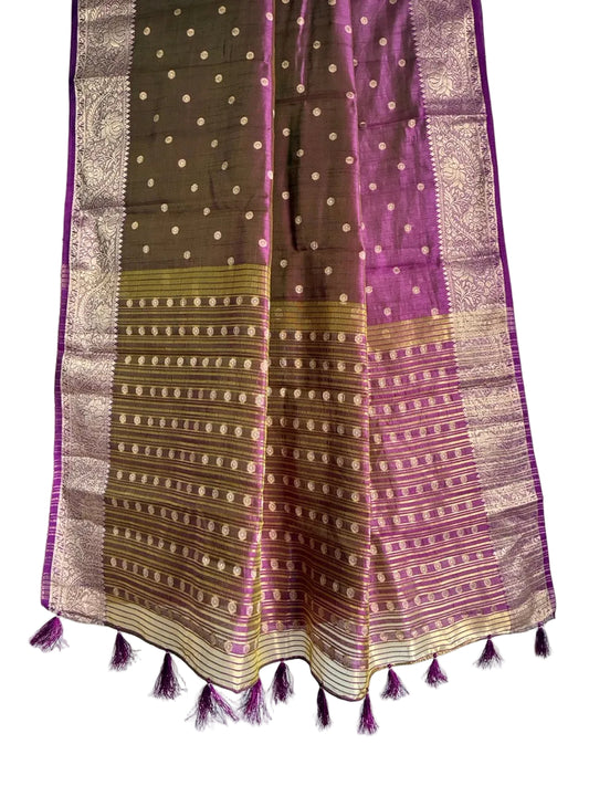 Detailed view of striped purple saree pallu with gold motif rows and tassel embellishments