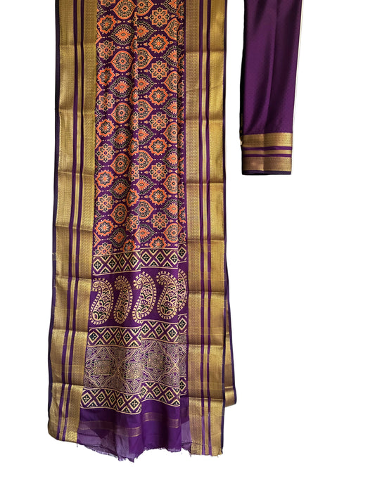 Rich purple saree with floral medallions in peach orange green accents full drape view Aariyaa sarees Bengaluru