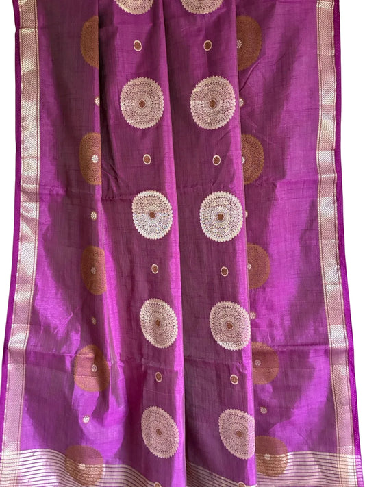 Close up of soft breathable purple fabric featuring delicate circular gold accents and slender border