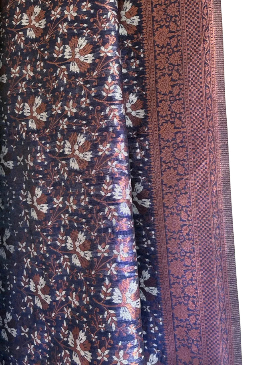 Detailed view of luxurious royal blue Banarasi saree pallu with copper and silver metallic sheen aariyaa