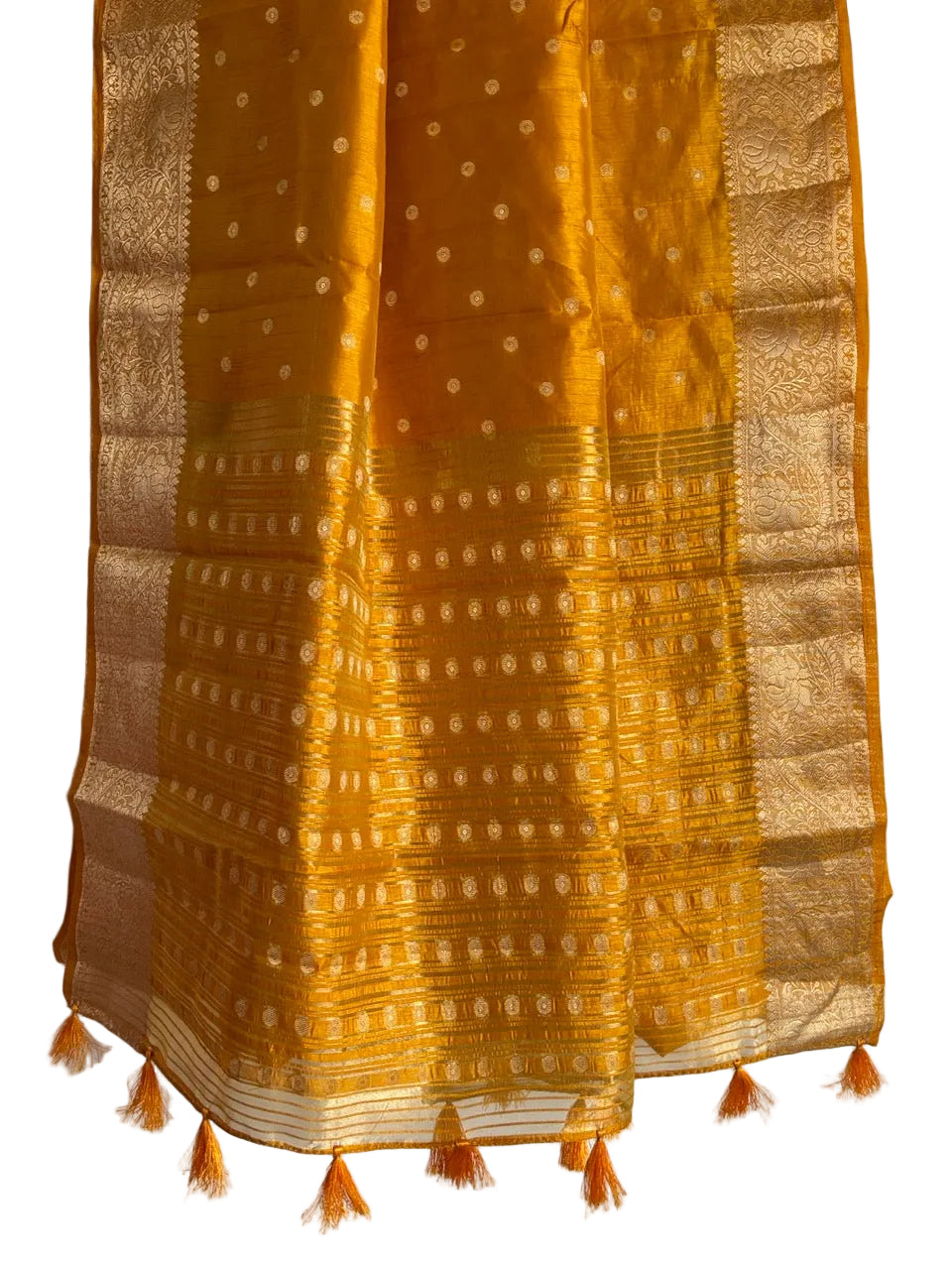 Detailed view of striped golden yellow saree pallu with gold motif rows and tassel embellishments